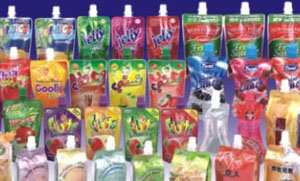 Stand-up pouch continuous filling and capping machine